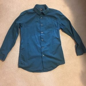 Slim fit teal dress shirt. Like new condition.